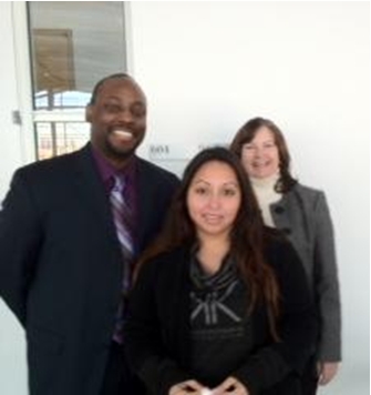 EEOC Trial Attorney Richard Sexton, Belinda Murillo (Center),
EEOC Trial Attorney Nancy Griffiths